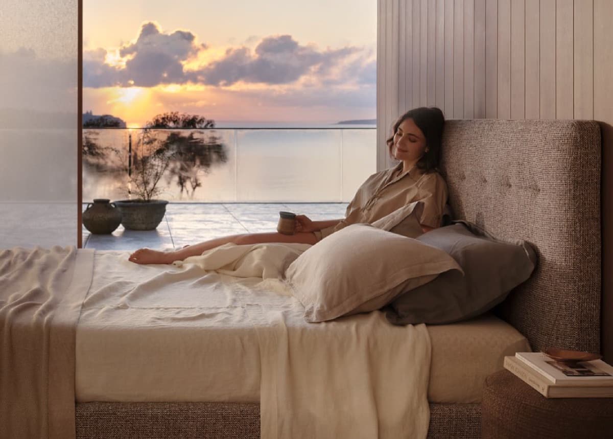 Waking slowly in bed in soft morning light